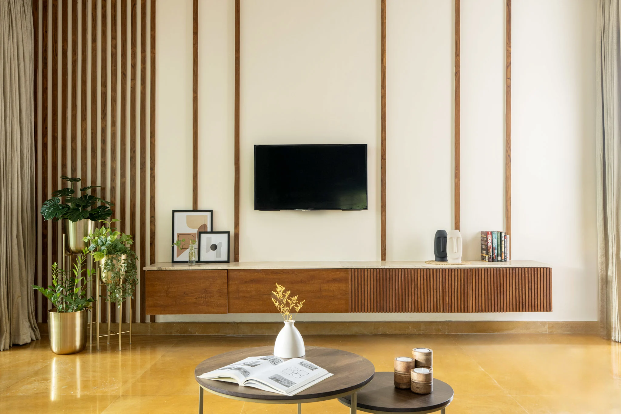 Modern TV unit design with wooden wall panels and floating storage cabinet