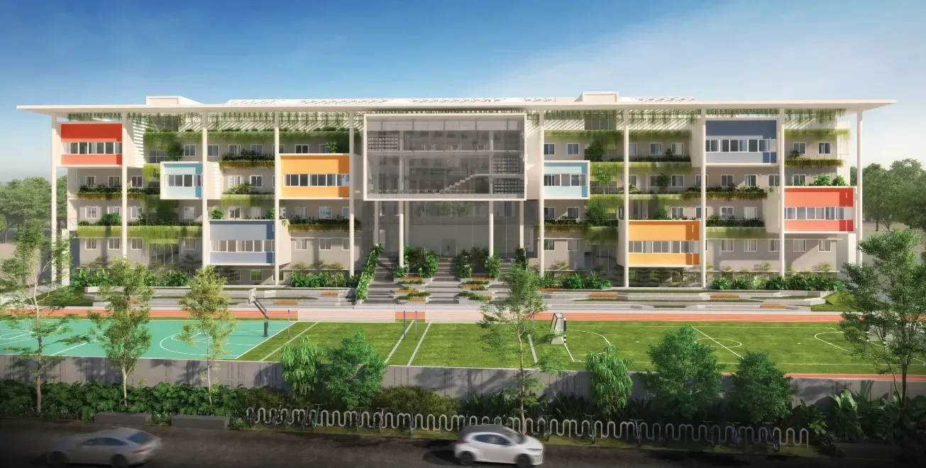 National Public School Ullal front facade with sports field and landscape design