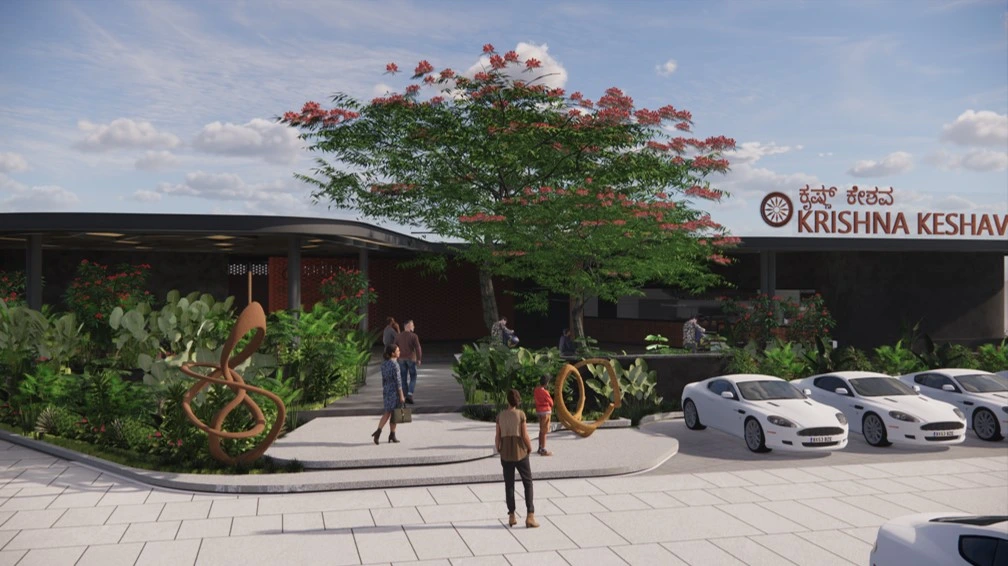 Main entry plaza of Krishna Keshava restaurant landscape project with lush greenery and outdoor gathering space